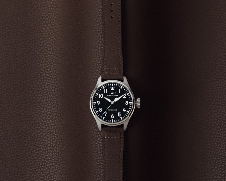 Front image of a watch with brown alternative leather strap