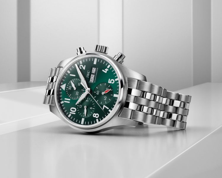 Front image of a green dial watch with a steel metal bracelet